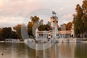 Buen Retiro Park is the largest Park in Madrid on a sunny summer day. photo