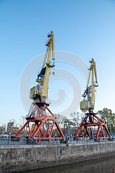 Old port cranes in the financial district of Puerto Madero in the capital of Argentina, Buenos Aires in 2023