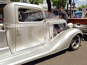 old silver gray utility pickup truck Chevrolet 1930s. Cab and nose. Expo Warnes 2021 classic cars.