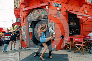 BUENOS AIRES - mar 2th 2024 Unidentified couple dancing tango in the street in Buenos Aires Argentina