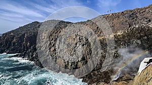 The Bufadora, a marine gesiser with a rainbow in the Mexican city of Ensenada, is a very touristic place in the Baja California.