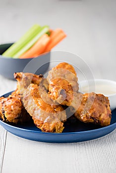 Buffalo chicken wings with celery carrot sticks