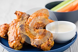 Buffalo chicken wings with celery carrot sticks