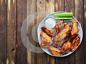 Buffalo chicken wings with ranch and celery