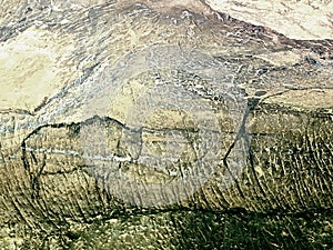 Buffalo hunting. Paint of human hunting on sandstone wall, prehistoric picture.
