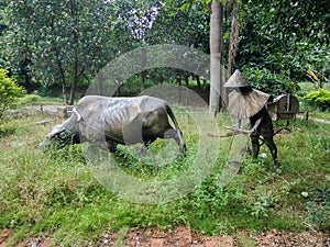 The buffalo plowed the sculpture