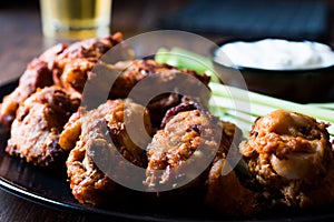 Buffalo Wings with Dip Sauce and Beer