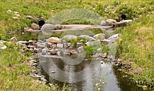 Buffer pond at a water treatment wetland in Finland