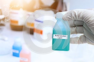 Buffer solution in glass, chemical in the laboratory and industry