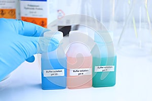 Buffer solution in glass, chemical in the laboratory and industry