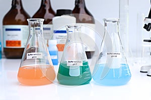 Buffer solution in glass, chemical in the laboratory and industry