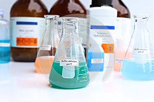 Buffer solution in glass, chemical in the laboratory and industry