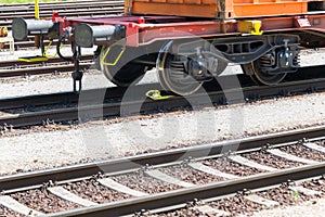 buffers container wagon railroad tracks sunny day