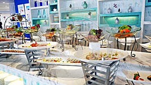 Buffet with fresh dishes at the catered buffet table decorated beautiful. slow motion. 1920x1080