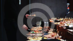 Buffet heated trays with sausages, in hotel luxury restaurant. All inclusive. Buffet food. Hotel serves buffet for breakfast.