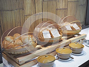 Buffet hommade bread bakery in bamboo basket for breakfast at hotel