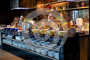Buffet line for breakfast in luxury hotel.