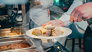 Business catering people take buffet food during company event