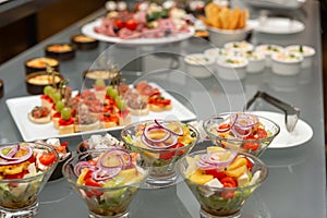 Buffet table with cold appetizers and salads