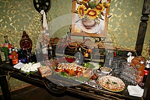 The buffet table with cold snacks
