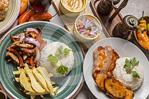 Buffet table sauted chicken with rice and french fries saltado de pollo Peruvian comfort food buffet traditional table