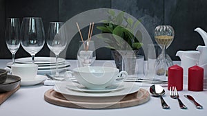 Buffet Table Setting , white plate fork and knife.