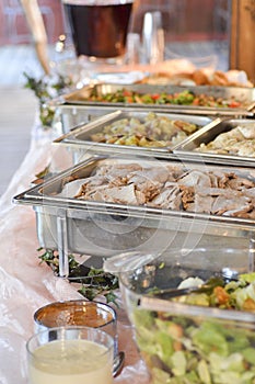 Buffet with Trays of Food at an Event