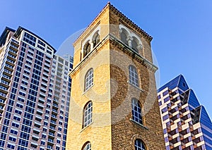 The Buford Tower on Cesar Chavez Street and Lady Bird Lake in downtown Austin Texas photo
