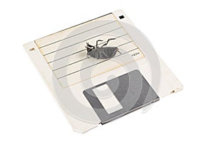 Bug on retro floppy diskette. Computer error concept