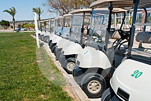 Buggies parked by the clubhouse in a golf course on the Costa Blanca in Spain