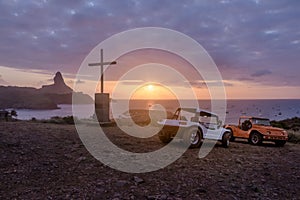 Buggies and Sunset View from Chapel of Sao Pedro dos Pescadores and Morro do Pico - Fernando de Noronha, Pernambuco, Brazil