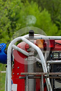 Buggy car exhaust pipe silencer on red frame rear view close up, auto cross race