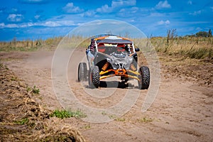 Buggy extreme riding in sandy track. UTV, 4x4, rally