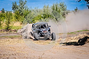 Buggy extreme riding in sandy track. UTV, 4x4, rally