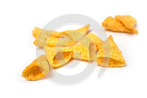 Bugles salted appetizers pile on white background