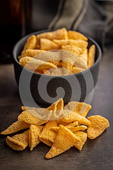 Bugles snack. Cone corn chips on kitchen table