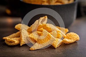 Bugles snack. Cone corn chips on kitchen table