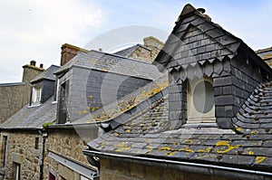 Buidings roofs details in Mont Saint Michele in France, Normandy photo