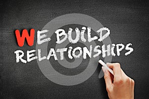 We Build Relationships text on blackboard
