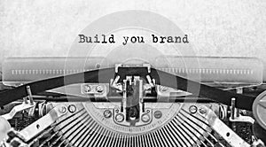 Build you brand words typed on a vintage typewriter