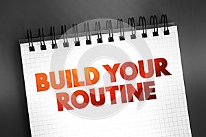 Build your Routine text on notepad, concept background