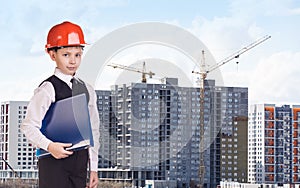 Builder boy in the orange helmet