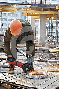 Builder with circular abrasive saw photo