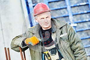 Builder concreter worker at construction site
