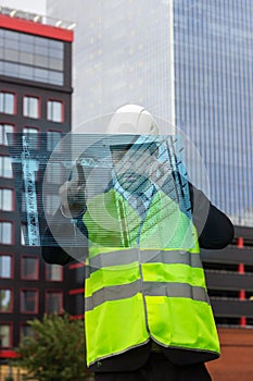 Builder control new technology hologram drawing architecture workman  taskmaster photo