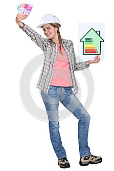 Builder with a energy rating sign