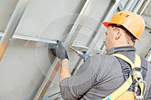 Builder at facade construction work