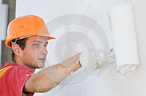 Builder facade painter at work