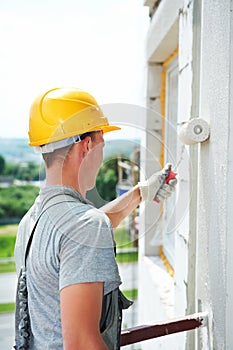 Builder facade painter worker