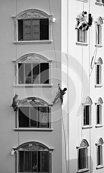 Builder facade painters working for a living